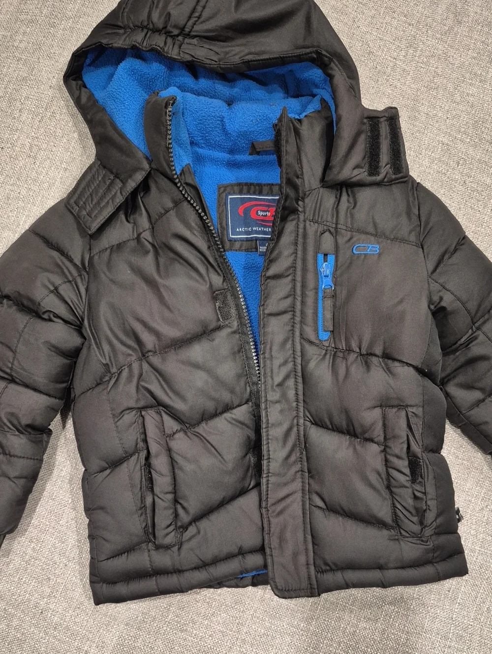 Kids Black Puffer Jacket with Blue Trim -